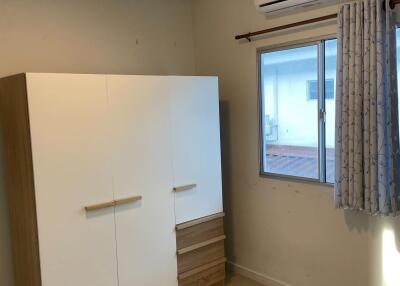 Bedroom with wardrobe and air conditioning