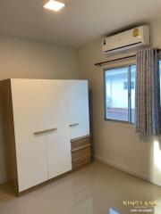 Bedroom with wardrobe and air conditioning