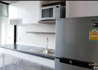 Modern kitchen with stainless steel appliances