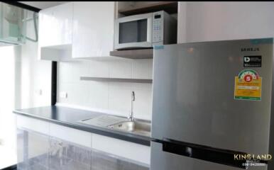 Modern kitchen with stainless steel appliances