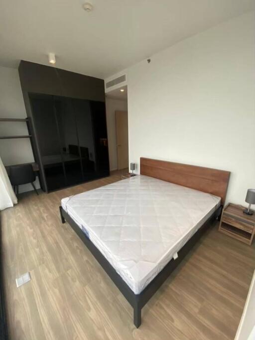 Spacious bedroom with double bed and wardrobe