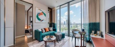 Modern living room with large windows and city view