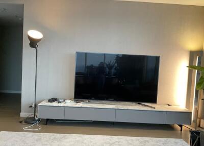 Modern living room with TV and lamp