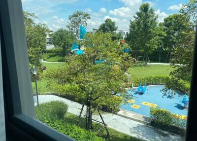 View of a garden with a playground