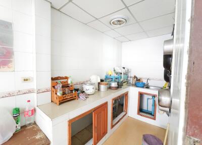 Bright and compact kitchen space with utilities