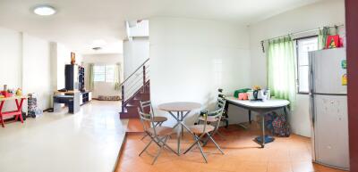 Bright kitchen and living area with modern furniture