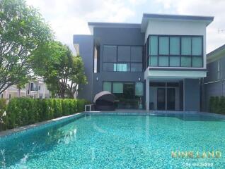 Modern two-story house with a swimming pool