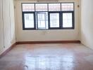 Unfurnished empty room with large windows