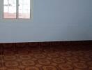 Empty room with tiled flooring