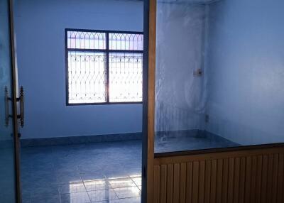 Empty room with glass door and window