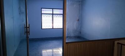 Empty room with glass door and window