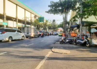 Street view with cars and motorcycles