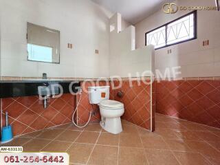 Modern bathroom with tiled walls and floor