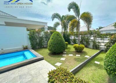 Beautiful landscaped garden with private pool and covered patio