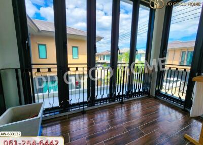 balcony view with glass doors and wooden floor