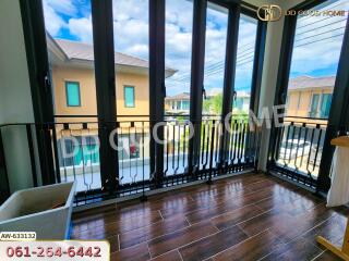 balcony view with glass doors and wooden floor