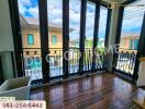 balcony view with glass doors and wooden floor