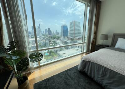 Bright bedroom with city view