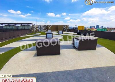 Rooftop area with seating arrangements and modern design