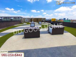 Rooftop area with seating arrangements and modern design