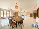 Spacious dining area with large windows and modern decor