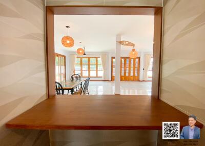 View of dining and living area from serving hatch