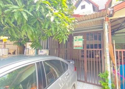 Exterior view of a house with a car parked in the driveway