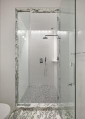 Modern bathroom with glass shower enclosure