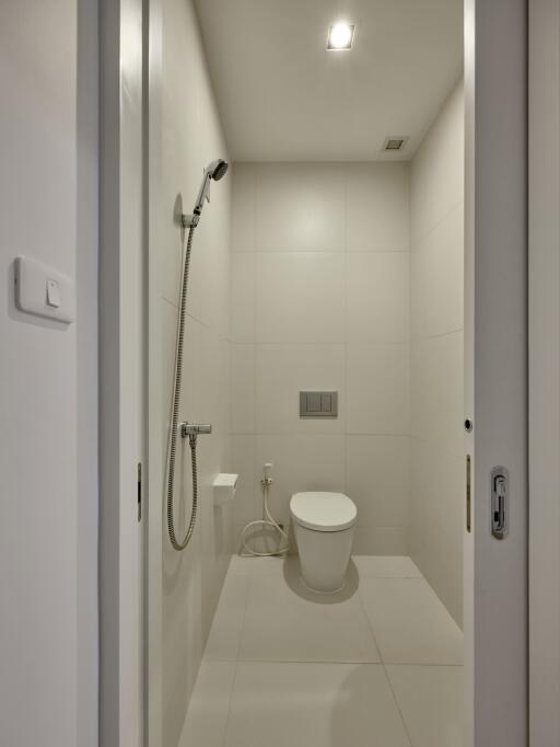 Modern minimalist bathroom with shower and toilet