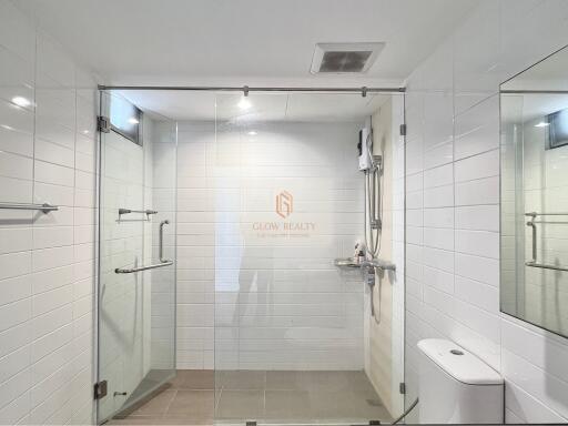 Modern bathroom with glass shower enclosure