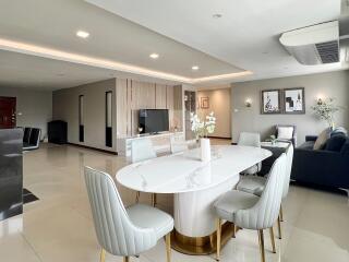 Modern living and dining area with contemporary furniture