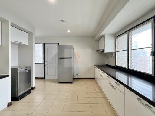 Modern kitchen with appliances and ample storage space