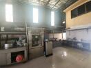 Industrial kitchen with high ceiling