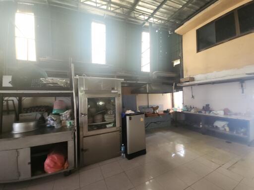 Industrial kitchen with high ceiling