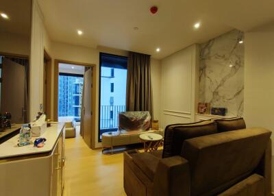 Modern living room with large window and balcony