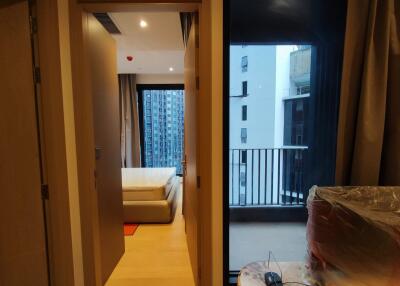 View of bedroom entry and balcony