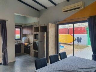 Dining area near kitchen with a view