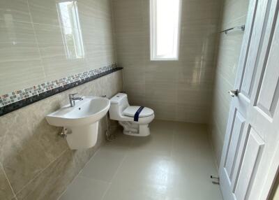 Modern bathroom with sink and toilet