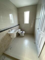 Modern bathroom with sink and toilet