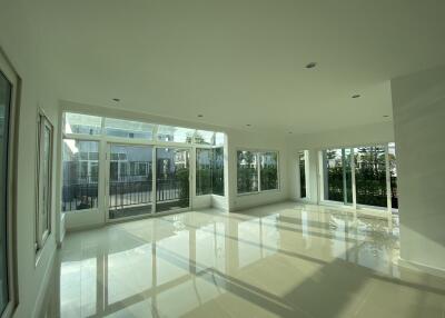 Spacious and well-lit main living area with large windows