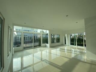 Spacious and well-lit main living area with large windows