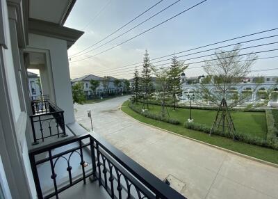 Balcony view with surrounding neighborhood