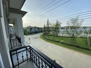 Balcony view with surrounding neighborhood