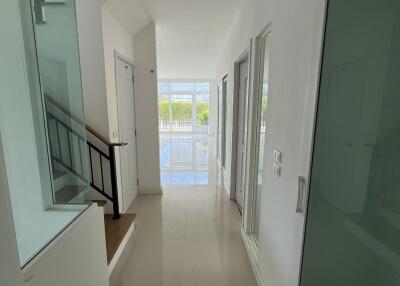 Bright and modern hallway with glass doors