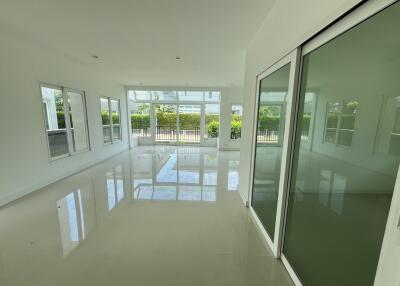 Spacious living room with large windows