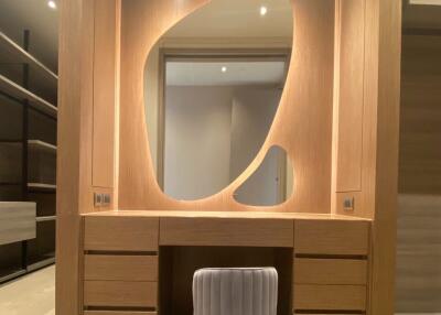 Contemporary bedroom with built-in vanity