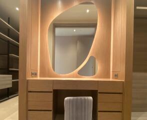 Contemporary bedroom with built-in vanity