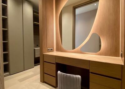 Bedroom with built-in wardrobe and wooden desk