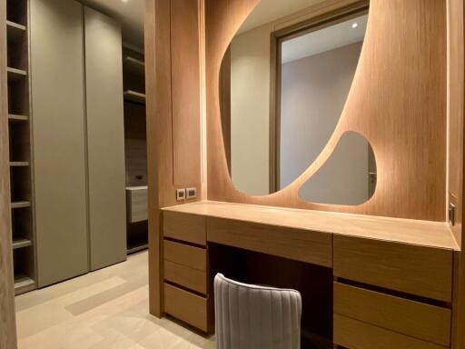 Bedroom with built-in wardrobe and wooden desk