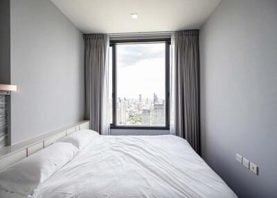 Bright bedroom with large window view